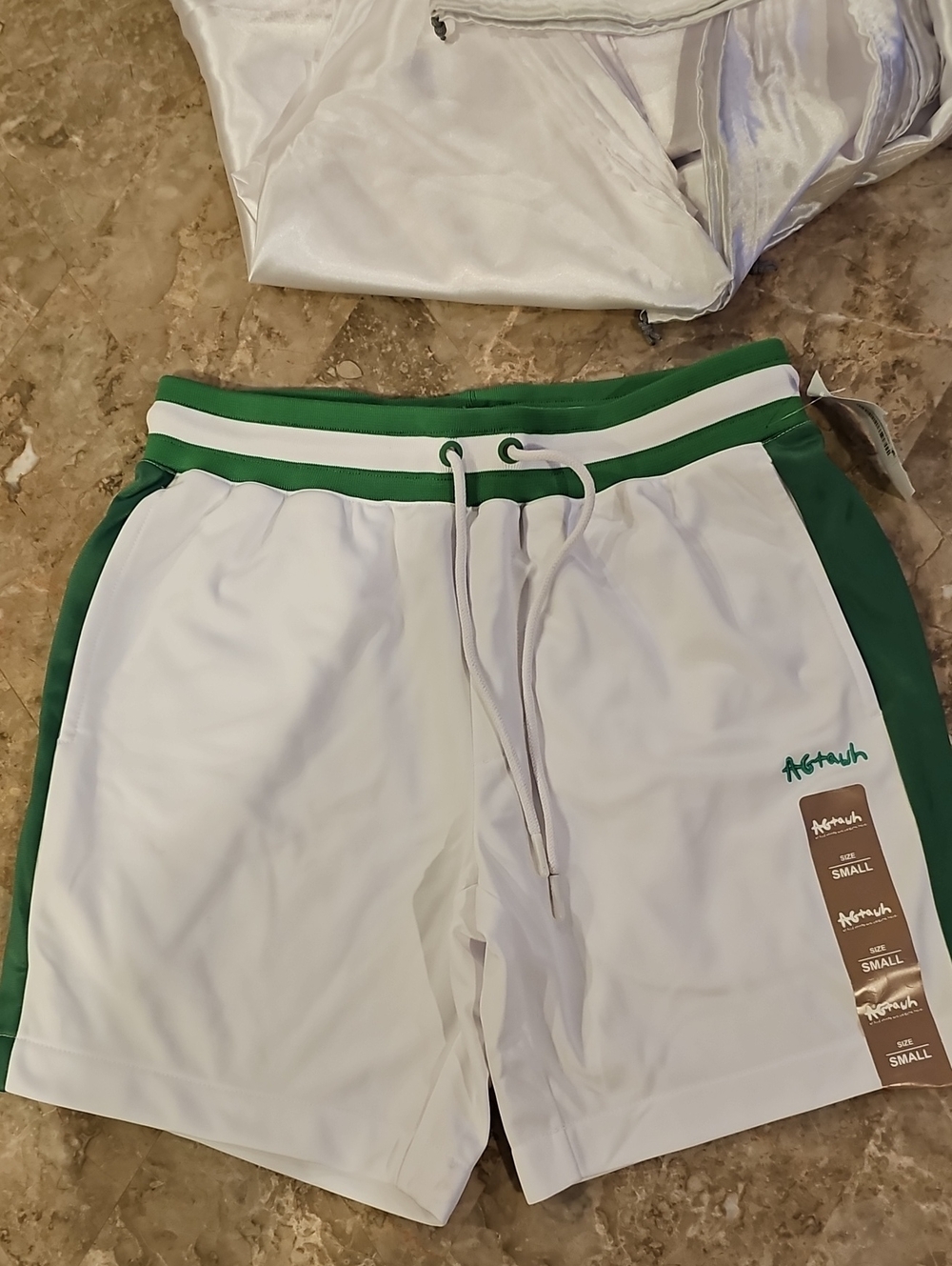 AGTAWH shorts, which stands for All Good Things Are Welcome Here. NWT